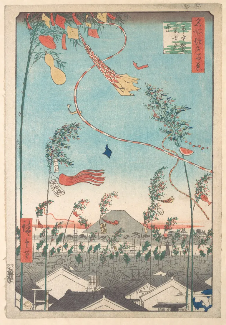 Tall Tanabata bamboo decorations rise over the rooftops of Edo in a Hiroshige print