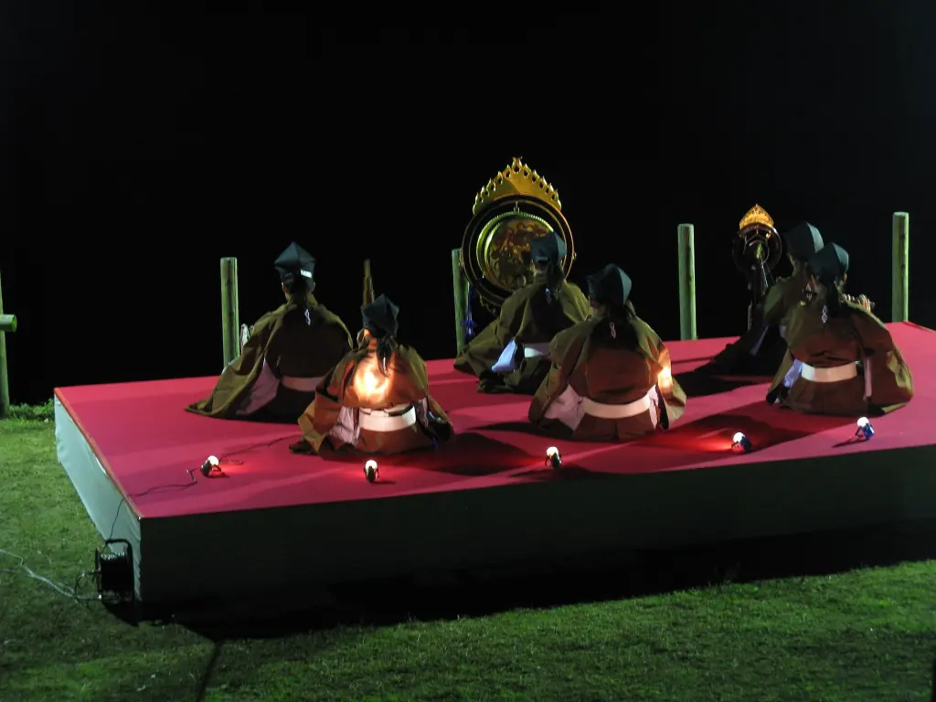 Gagaku musicians in traditional court costumes performing outdoors
