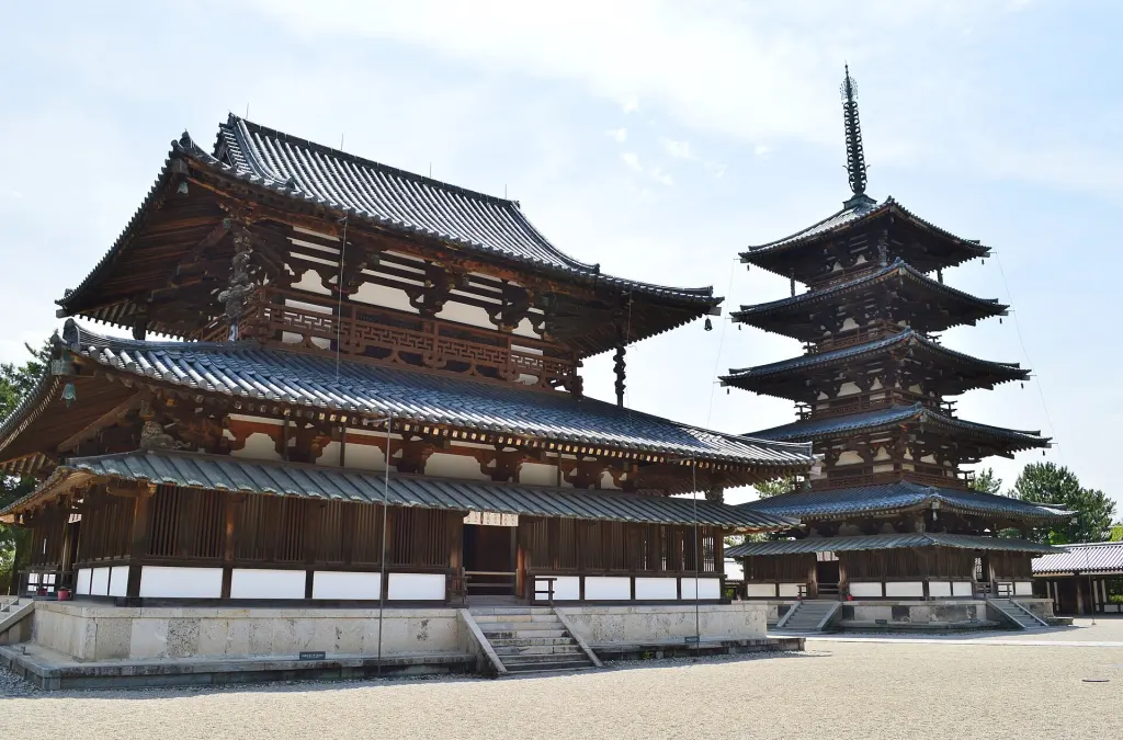 The wooden Golden Hall and five-storey pagoda of Hōryū-ji under a blue sky