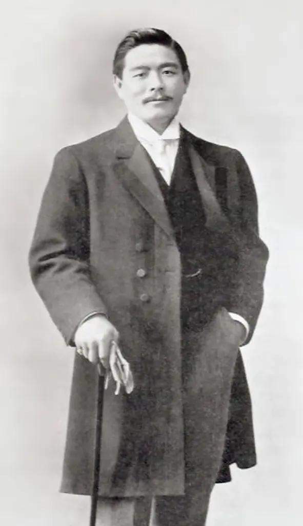 Historical portrait of Mitsuyo Maeda wearing a dark suit