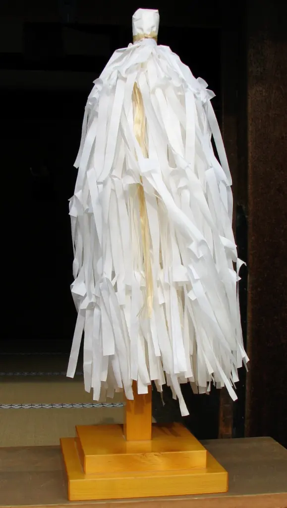 White paper shide hanging from an ōnusa purification wand at Sumiyoshi Taisha