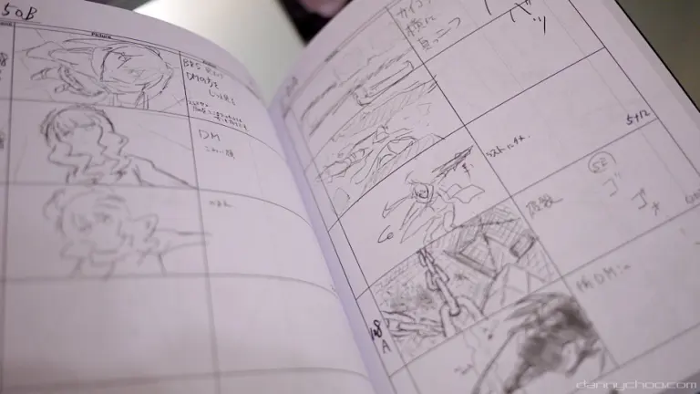 Open e-conte storyboard pages with drawn panels and handwritten notes