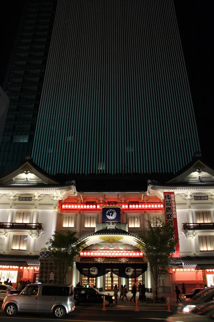 White traditional-style facade of Kabuki-za with Kabukiza Tower rising behind it in Ginza