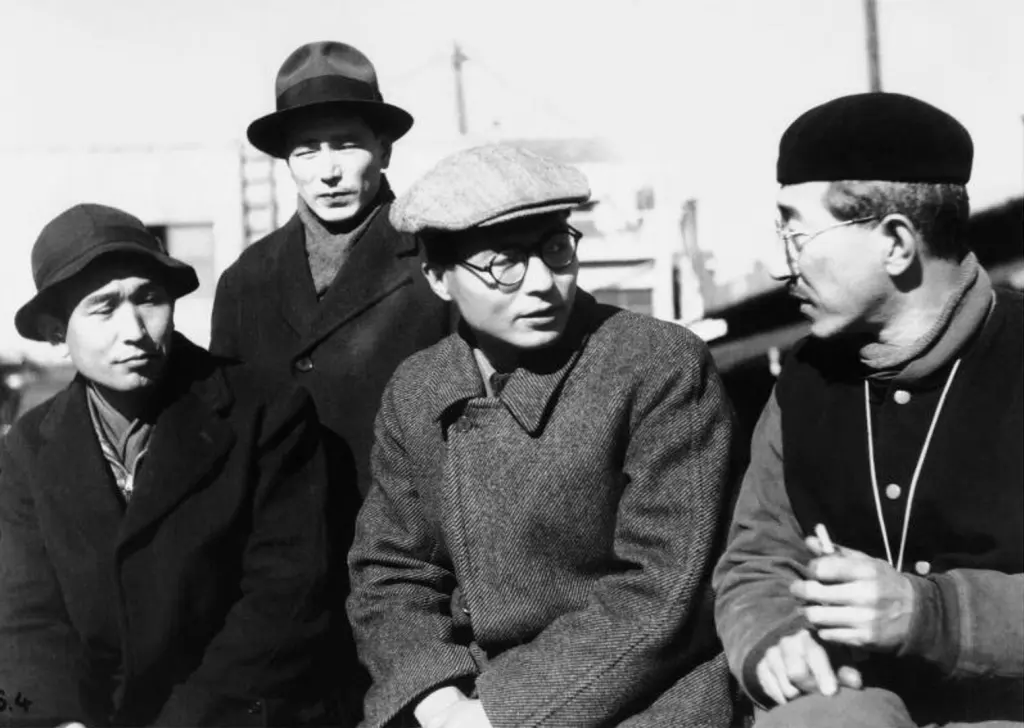 Four filmmakers, Kurosawa, Honda, Taniguchi and Yamamoto, posed together.