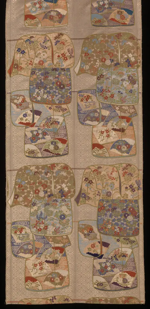 Long Japanese silk obi with colourful textile patterns on a dark ground