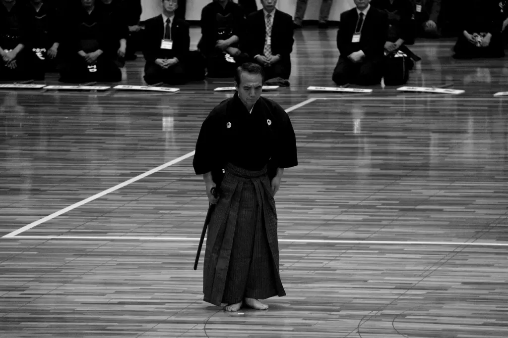 Two practitioners perform a standing bow in Nihon Kendō Kata
