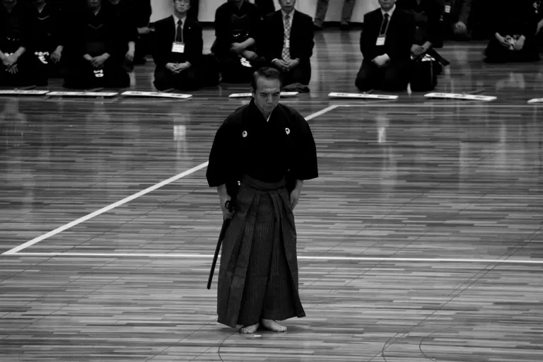 Two practitioners perform a standing bow in Nihon Kendō Kata
