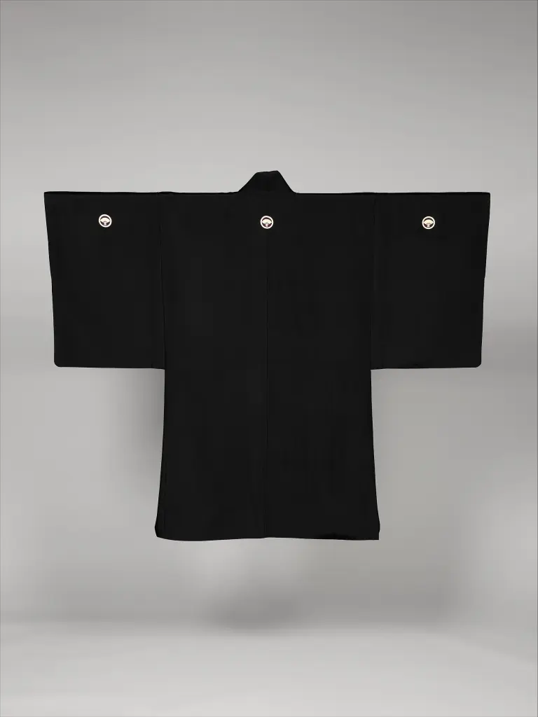 Back view of a black men's formal haori jacket displayed with its wide sleeves extended