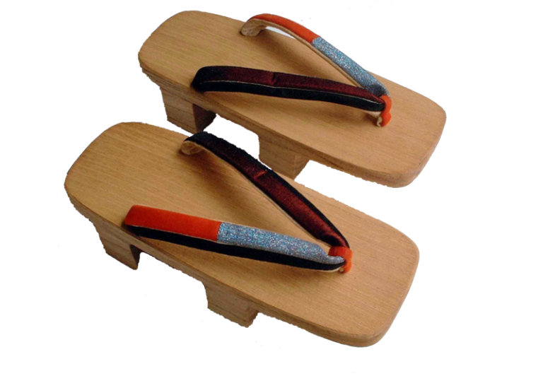 Pair of wooden Japanese geta with two raised teeth and patterned thongs