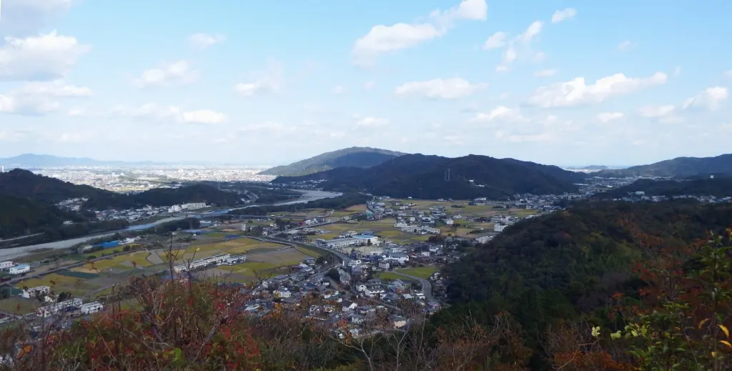 Wooded hills and a plain seen from Ichinomiya Castle ruins.