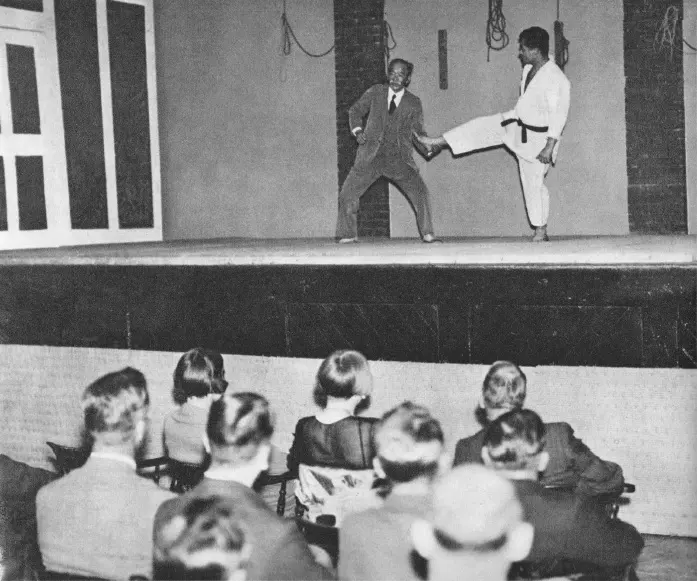Jigoro Kano and Sumiyuki Kotani demonstrating a Judo technique in London in 1933