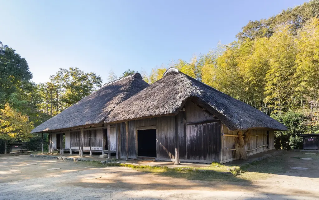 Traditional thatched-roof Japanese house at an open-air museum in Kawasaki
