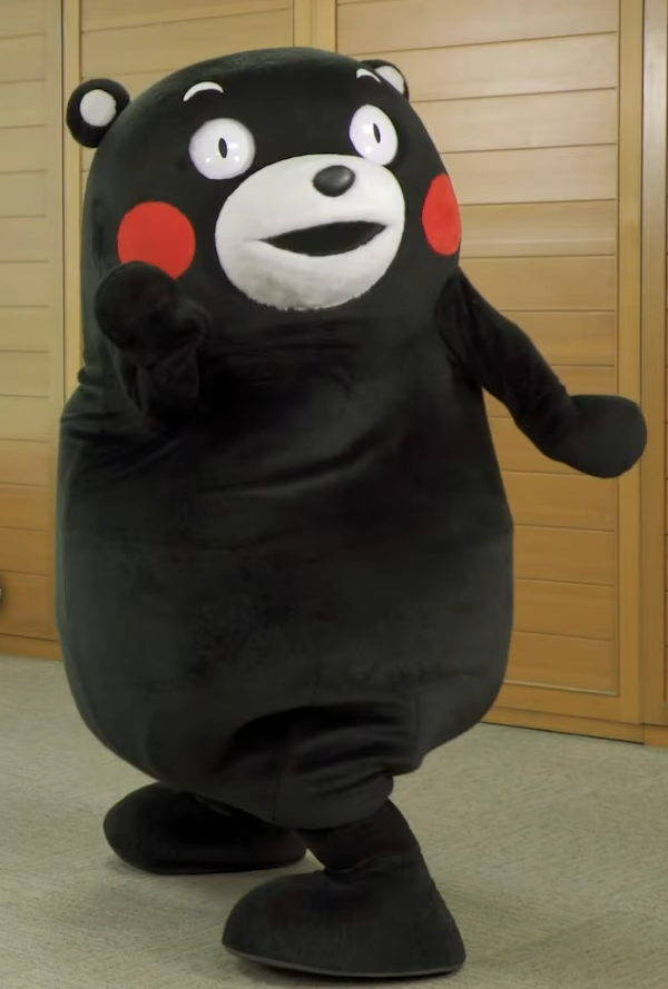 Kumamon, a black bear mascot with red cheeks.