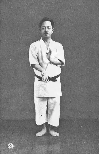 Black-and-white portrait of Kenwa Mabuni in a karate uniform