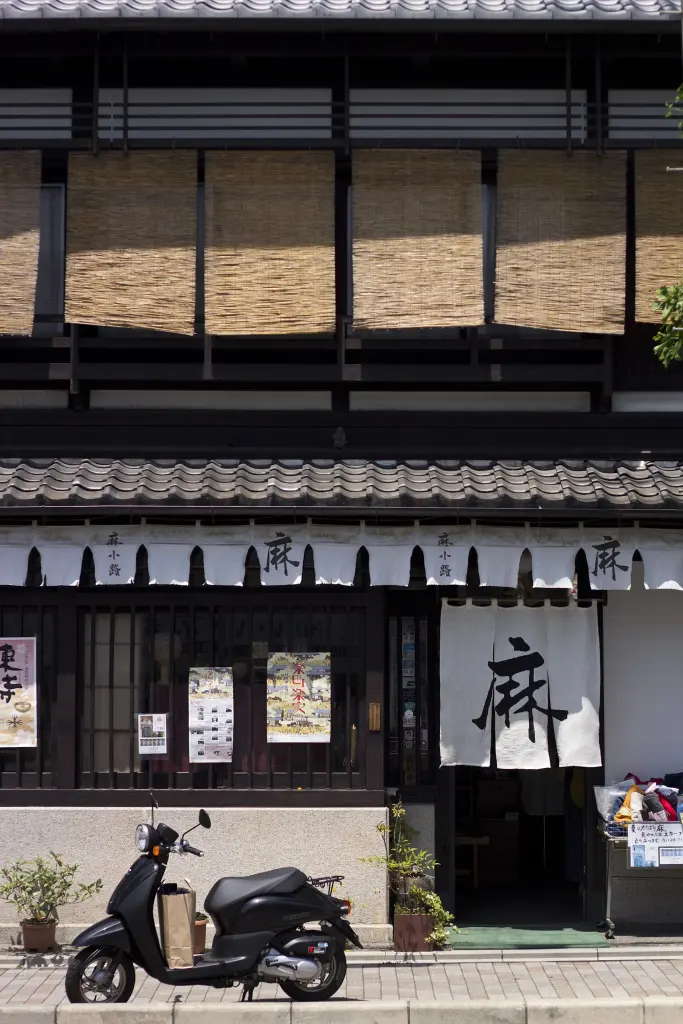 Traditional machiya street façade near Nijō Castle in Kyoto