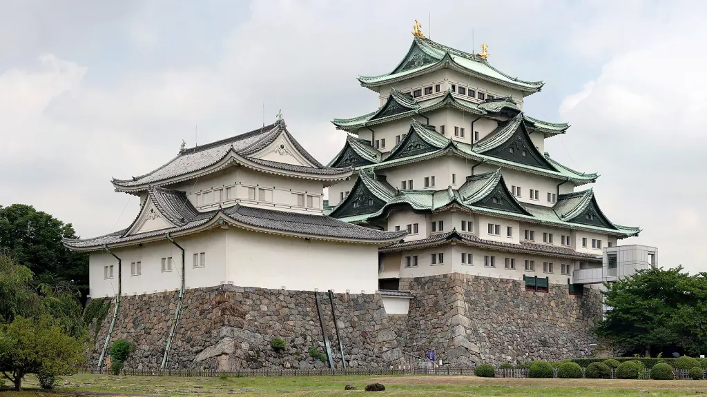 Nagoya Castle’s green-roofed main keep above its stone base.