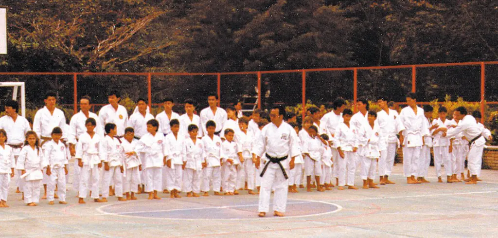 Gōjū-ryū instructor teaching a group of karate practitioners